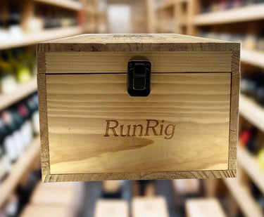 Wooden box with 'RunRig' branding on a white background