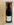 Wine bottle in a wooden box with straw lining