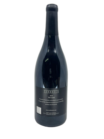 Wine bottle with a label on a white background