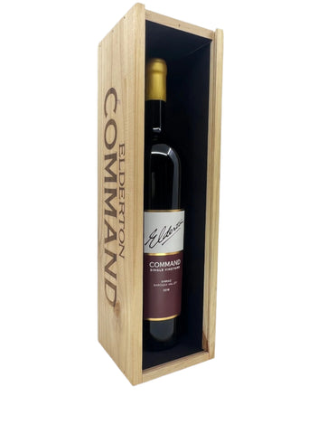 Wine bottle in a wooden box with 'Elderton Command' branding on a white background