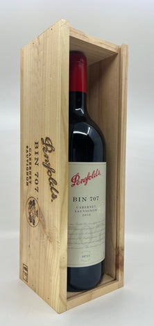 Penfolds BIN 707 wine bottle in a wooden box on a white background