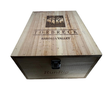 Wooden wine box with 'Torbreck' branding on a white background