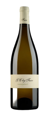 Bottle of F. G. by Farr Chardonnay on a dark background