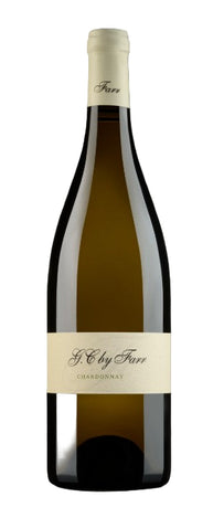 Bottle of F. G. by Farr Chardonnay on a dark background