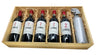 Six bottles of Z Force wine in a wooden box with decorative straw and ribbons.